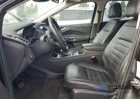2017 Ford Escape Titanium z USA, uszkodzony, nr VIN 1FMCU0J92HUE48108